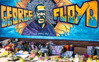 Beautiful yellow and blue graffiti mural in Chicago honoring George Floyd.